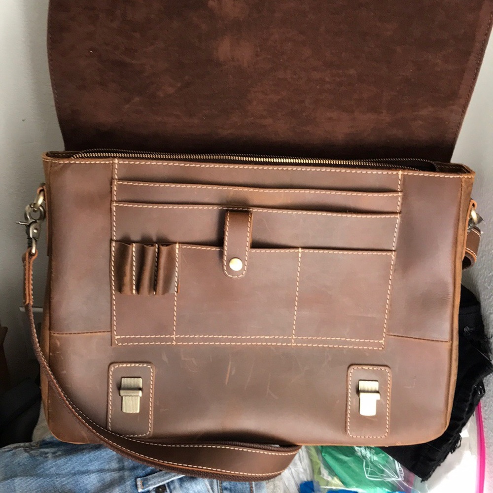 I am selling a brown leather (briefcase) for man